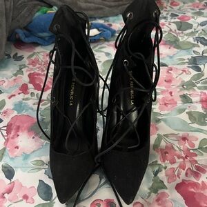 Black strapped high heels